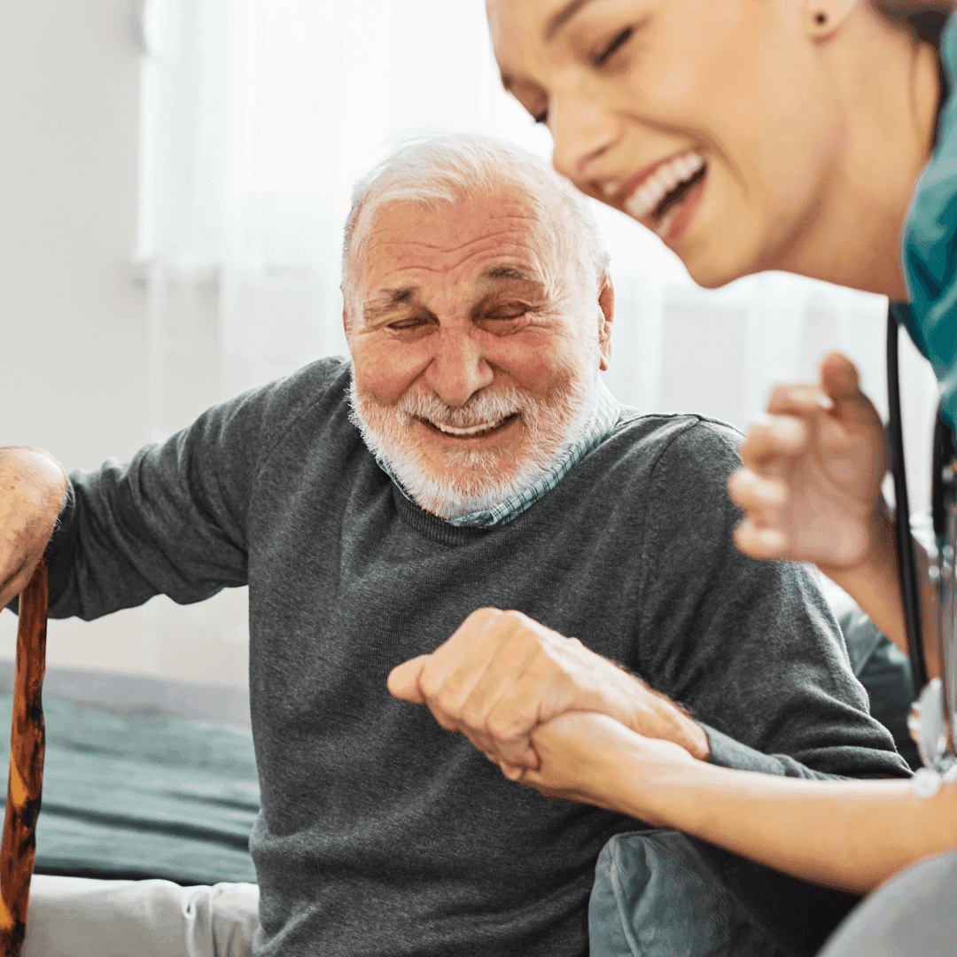 An Aktrapid nurse sharing a laugh with an elderly client
